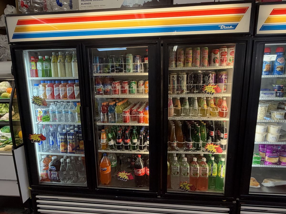 Drinks cooler with Mexican Coke, Jarritos, aloe drinks and juices