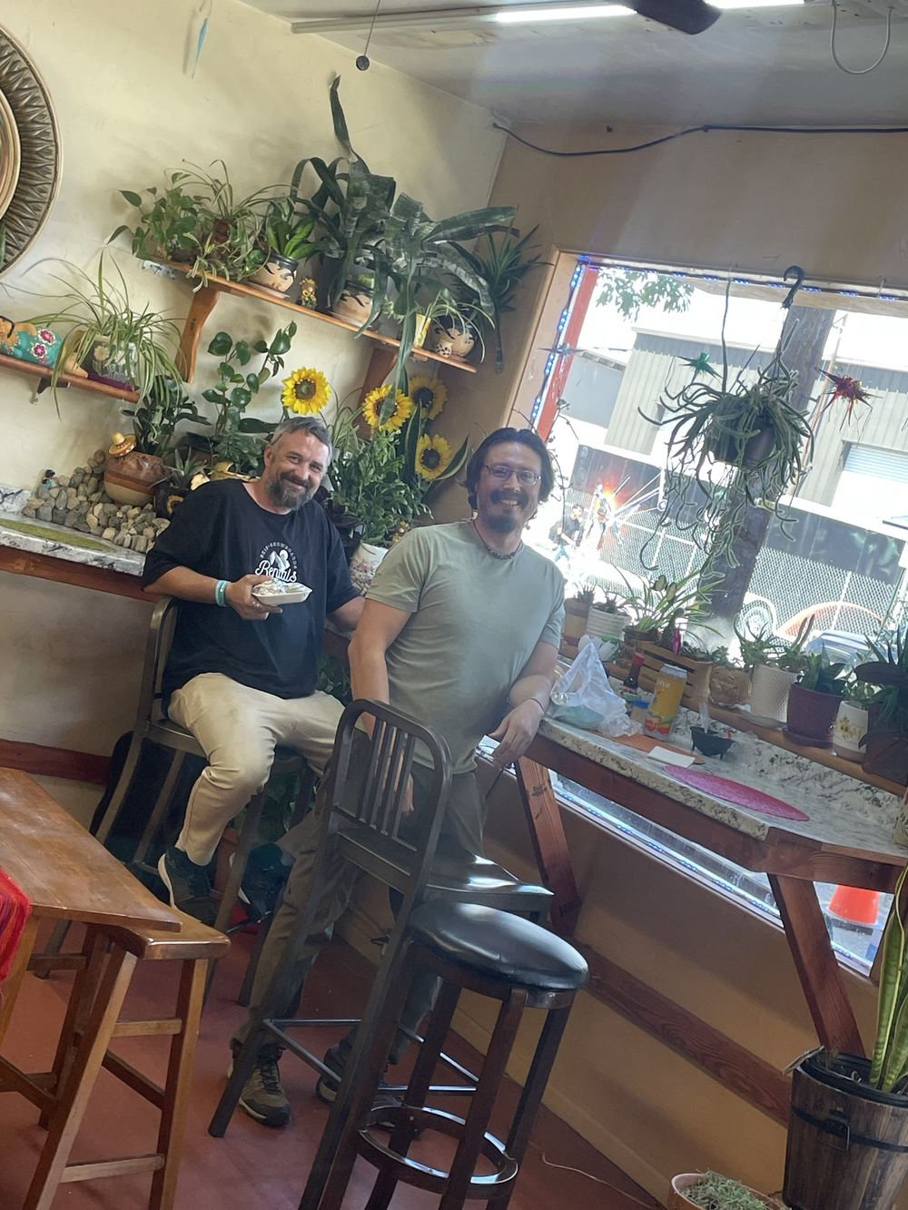 Two customers at the window counter