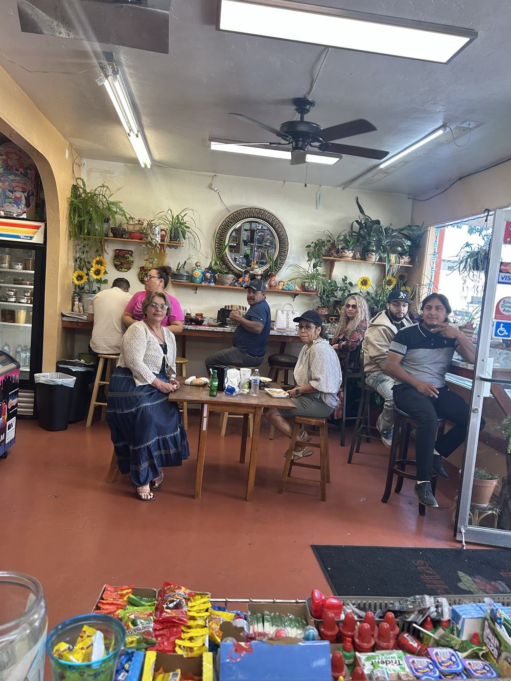A full dining room of customers